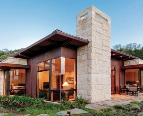 Butt glazed corner wood clad window in modern home Butt glazed corner wood clad window in modern home