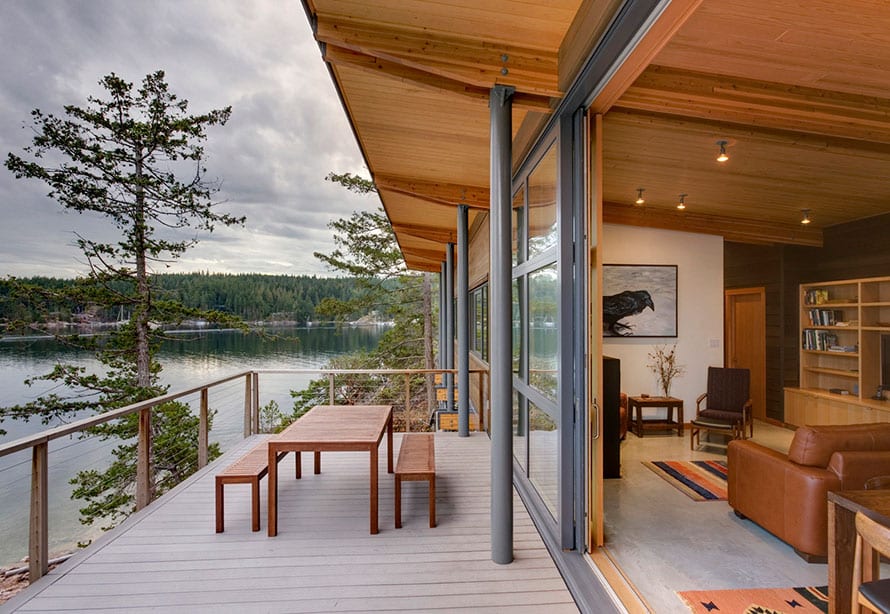 Balance Associates - Wood clad lift and slide doors by the sea