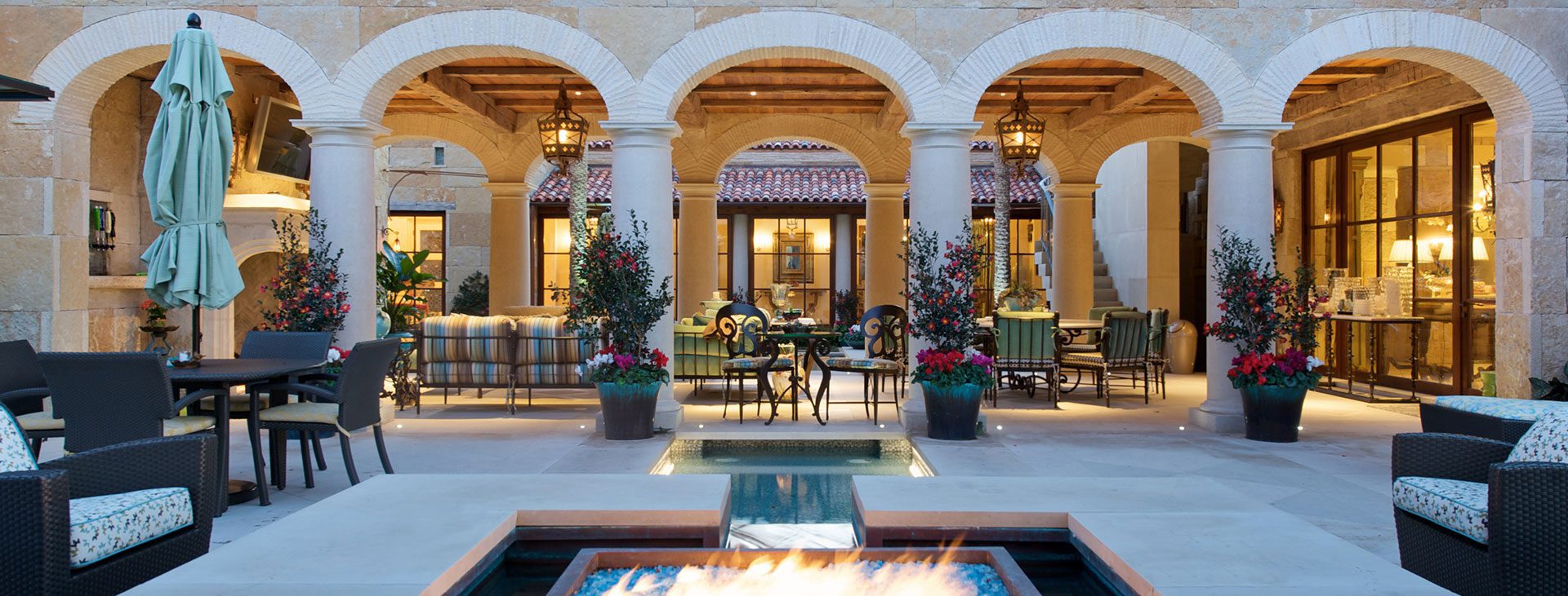 Yuill_Dillard-18-1920x731 A Texan residence with fire table and arched columns and traditional wood windows