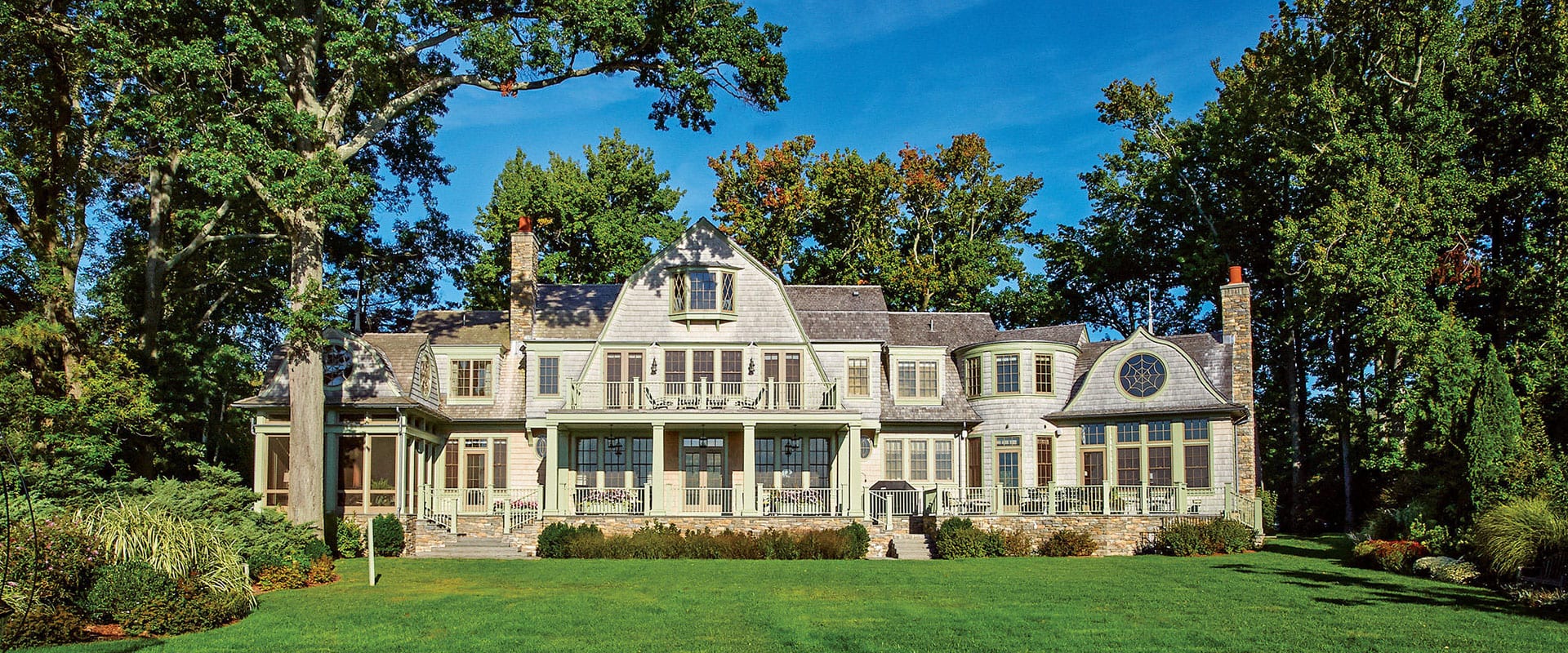 rye-traditional-1920x800 Shingle style home overlooking Long Island exterior view