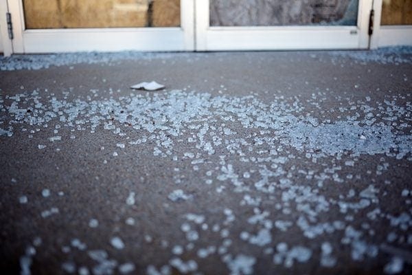 Laminated glass holds the shards together when broken under impact. Unlike tempered glass which breaks into thousands of small pieces.