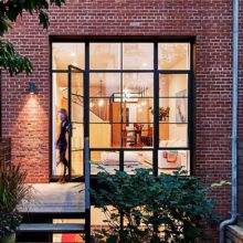 Arte steel and glass door in window wall