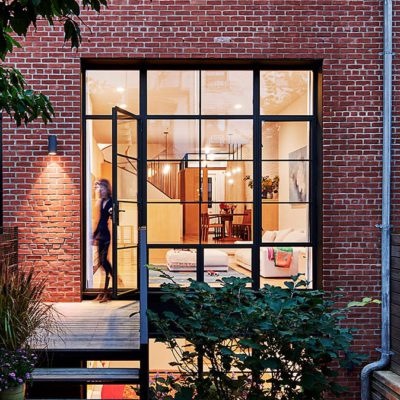 Arte steel and glass door in window wall