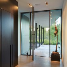 Wood pivot entryway door