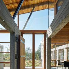Modern wood and glass doors in entryway