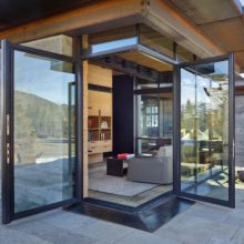 Steel hinged doors that meet in a corner Steel hinged doors that meet in a corner