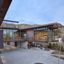 Modern mountain home with steel windows cantilevered living areas Modern mountain home with steel windows cantilevered living areas