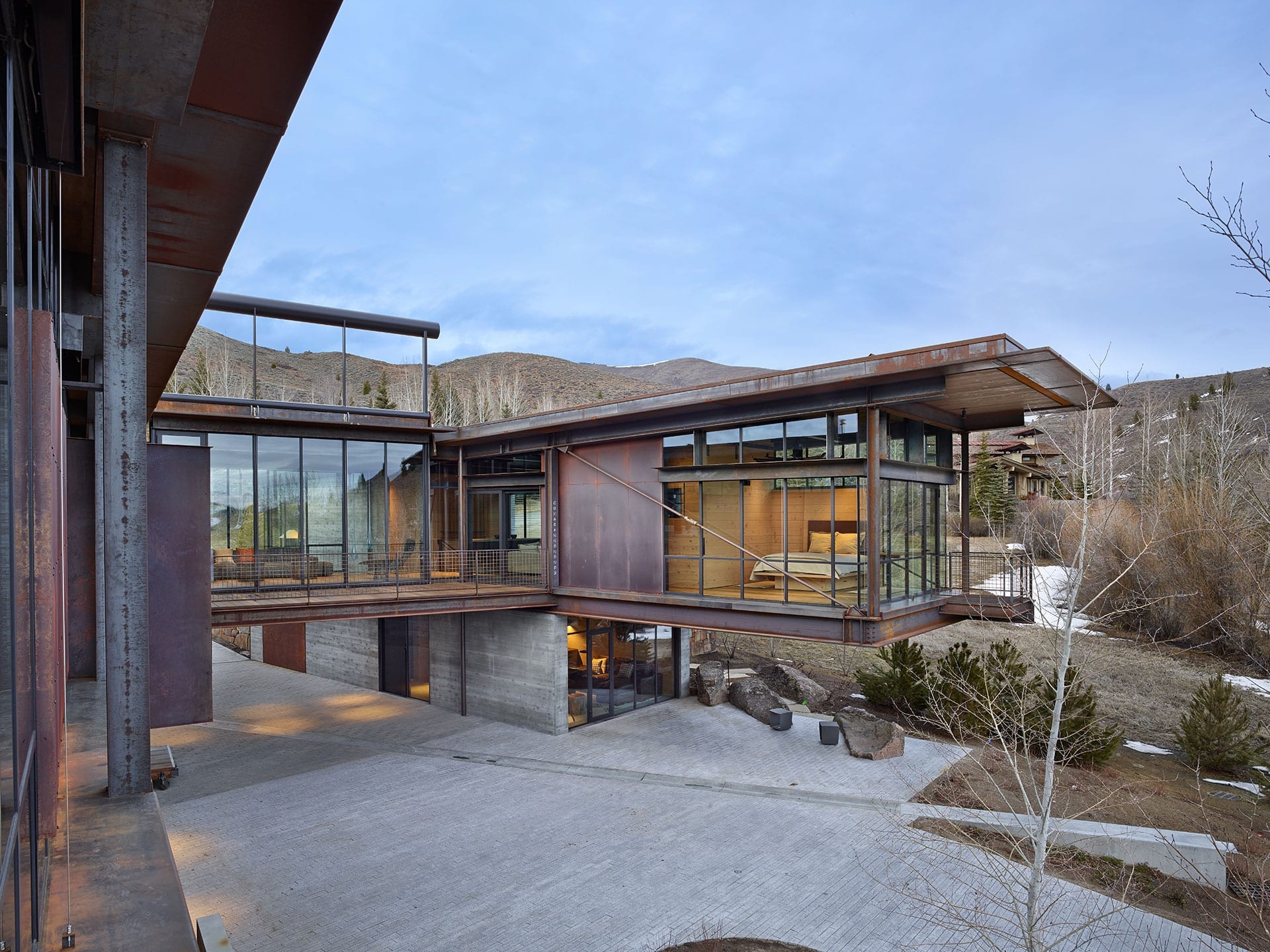 Modern mountain home with steel windows cantilevered living areas