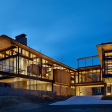 Modern windows night lit in modern mountain home Modern windows night lit in modern mountain home