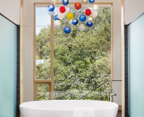 bath288460-1400 Wood storefront window in bathroom of Hog Pen Creek Residence on the lake front