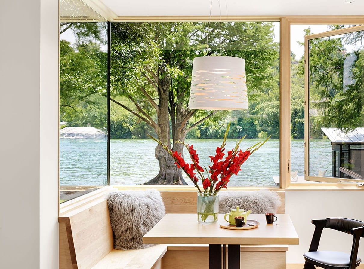 Modern wood storefront window in breakfast nook - Hog Pen Creek Residence