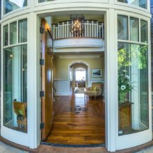 Curved entry door on the Ocean Bluff Curved custom wood entry door