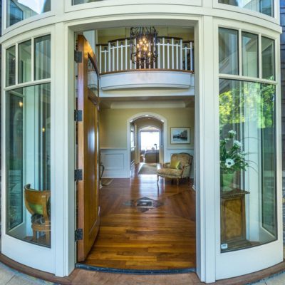 Curved entry door on the Ocean Bluff Curved custom wood entry door