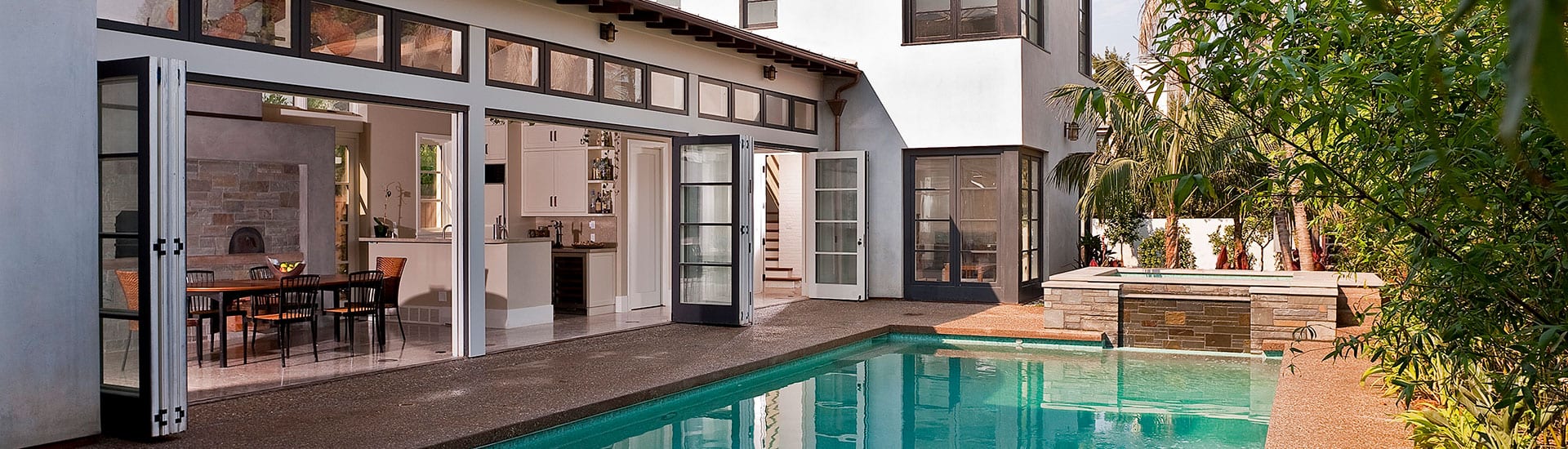 bifold6-1920x550 Exterior bifold doors open to pool area