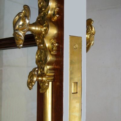 Ornate custom door handle hardware on traditional door