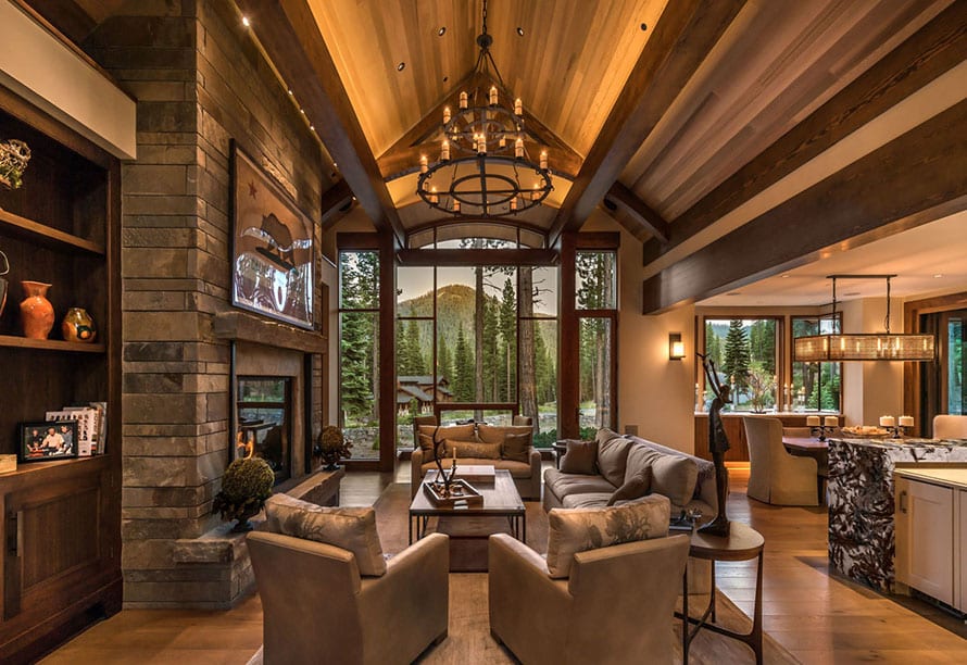 Looking out living room modern windows in Lake Tahoe mountain home
