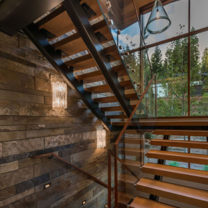 stairwell with modern residential storefront windows