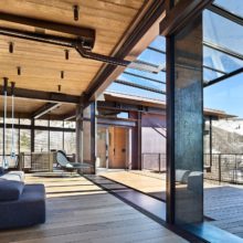 Tilting kinetic operated window wall in open position