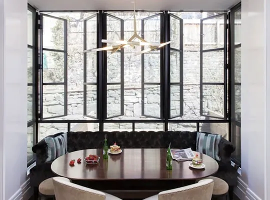 Casement windows Matching wood sliding patio doors in modern home